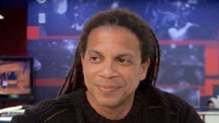 Charles Latibeaudiere: TMZ Executive Producer and Marriage Charles Latibeaudiere, TMZ executive producer, smiling in the TMZ newsroom